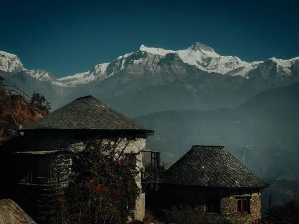 Mountains and House at the background