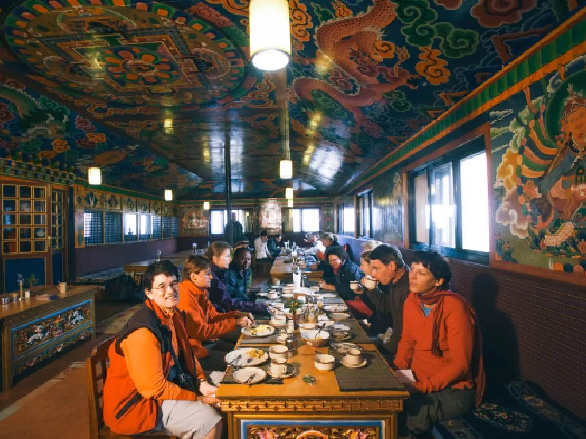 Firs time trekkers enjoying their lunch at tengboche monastery