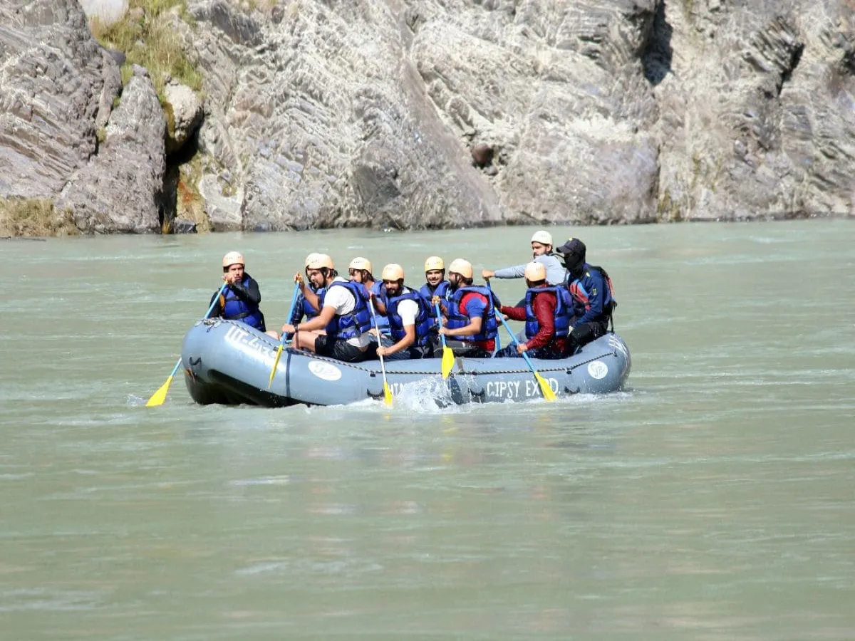 People having their time river rafting