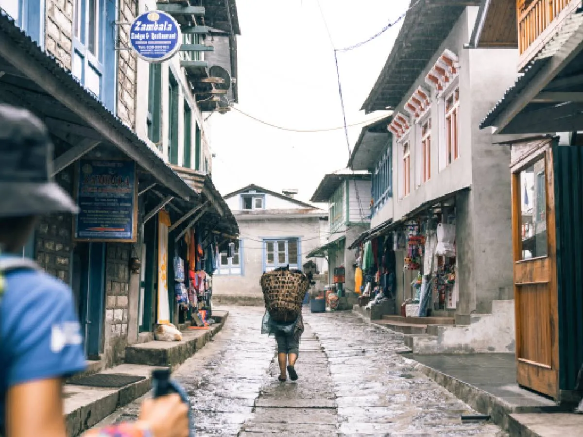 Trekker walking Lukla Bazar Nepal