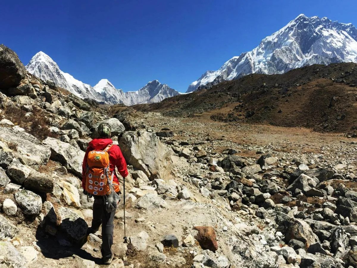 Trekker walking on Everest climbing