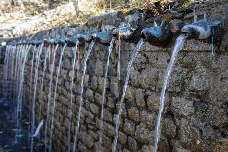 The 108 water taps at Muktinath Temple, a sacred pilgrimage site for Hindus and Buddhists.