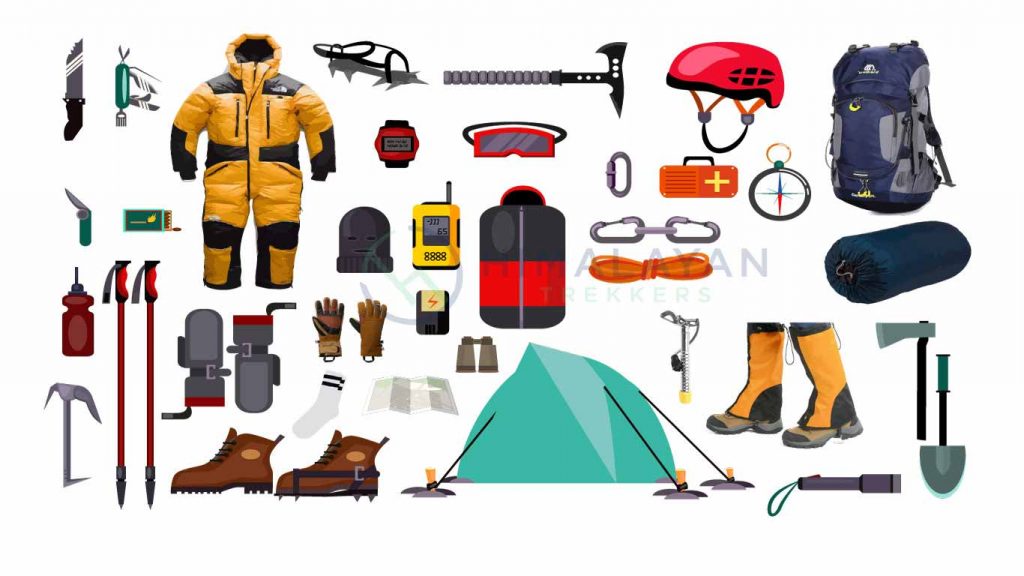 Trekking equipment and gear laid out for Everest Base Camp preparation.