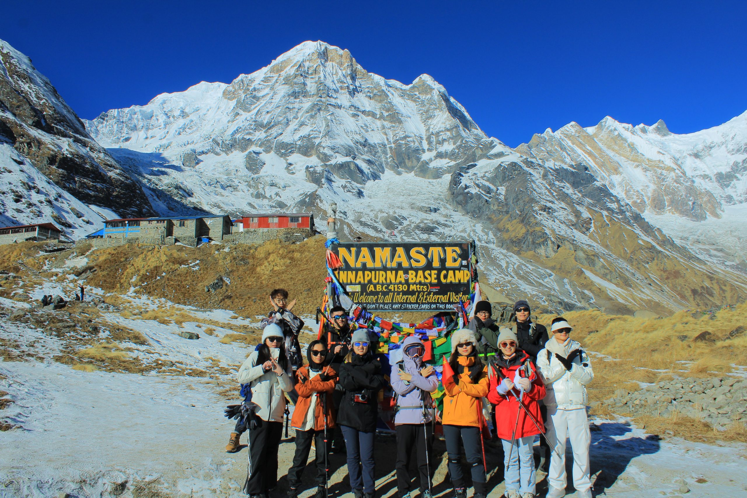 Trekkers posing for pictures at Annapurna base camp