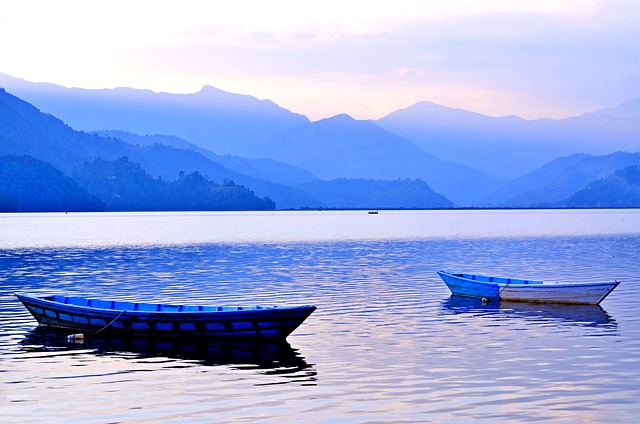 Experience tranquility at its best at Phewa Lake in Pokhara, Nepal. The vibrant boats resting by the shore and the verdant greenery make it a picture-perfect escape.