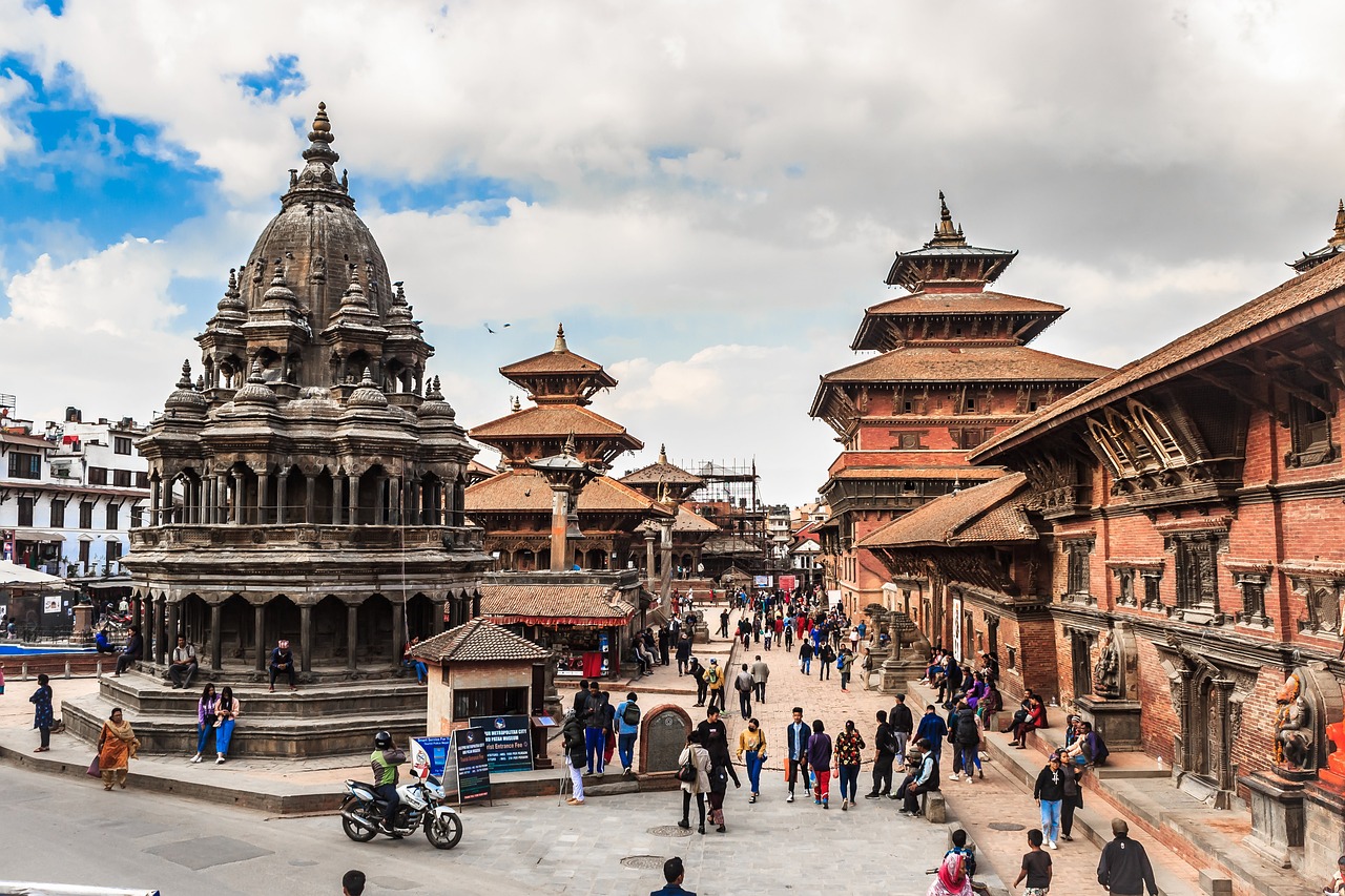 Patan Durbar Square in Lalitpur, Nepal, featuring ancient temples, stone statues, and intricate Newari architecture.