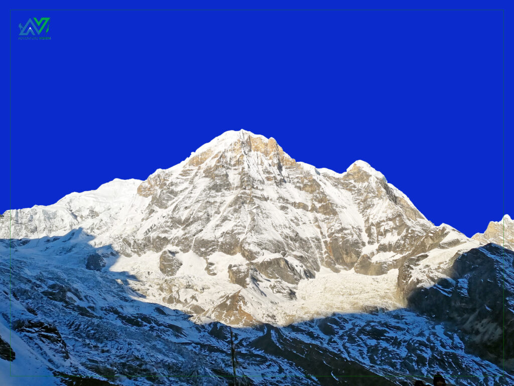 Majestic Annapurna Peak, towering above the landscape, a breathtaking sight that captures the raw beauty and grandeur of the Himalayas.