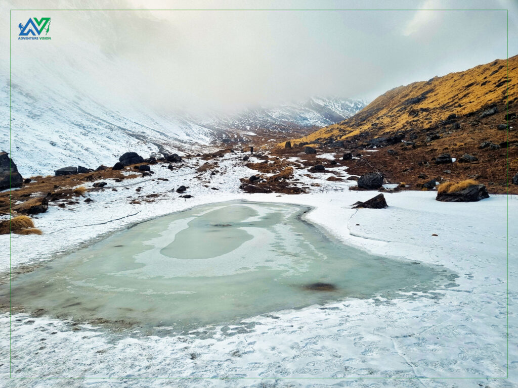 Mystical beauty of the ABC Trail: Fog wraps the path in a serene embrace, while frozen waters resemble shimmering glaciers, creating an otherworldly landscape.
