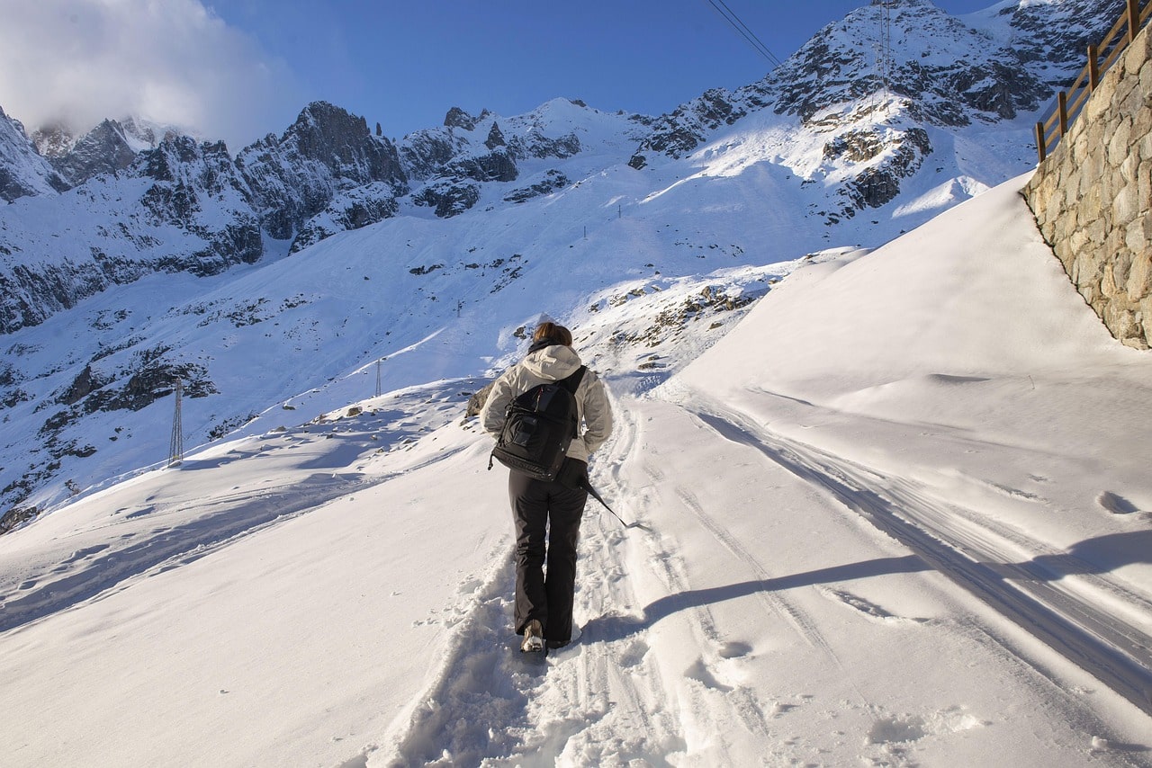 A pristine snowy trail stretching through the mountains, Manaslu Circuit Trek in December