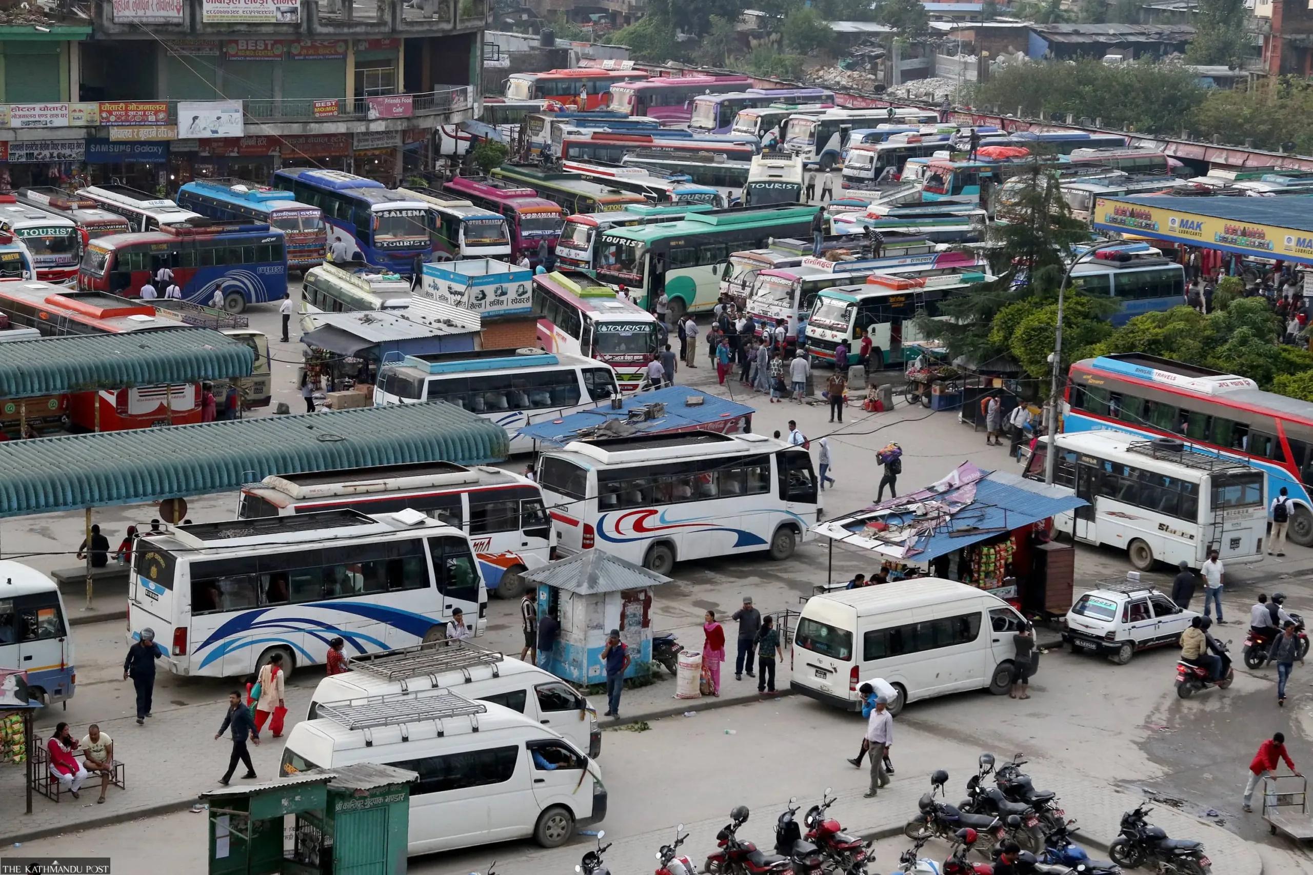 Buses at Gongabu Bus Park in Kathmandu, the busiest hub for travelers heading towards the Annapurna Circuit starting point.