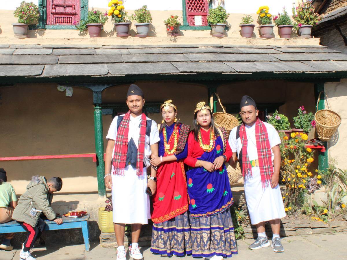 People clicking picture at Ghandruk village in the traditional attire