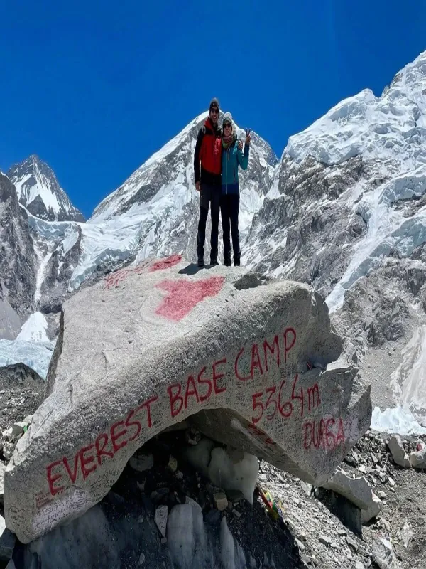 Couple clicking picture at Everest base camp for honeymoon trip