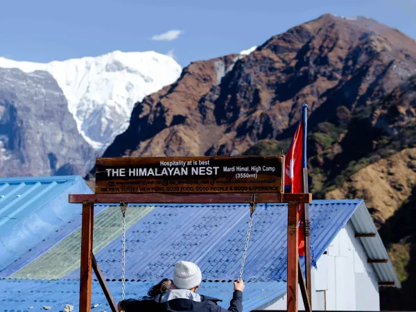 A Coupple Enjoying Swing Situated In Mardi Himal