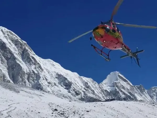 Helicopter Flying Over Everest Peaks
