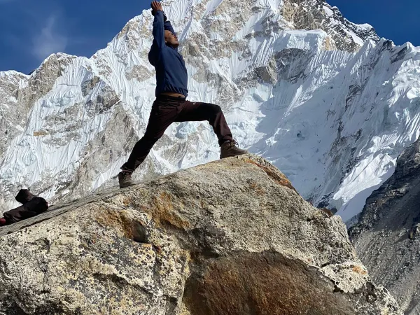 People Doing Prayanam Infront Of The Mountains