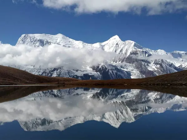 Reflection Of Annapurna Iii And Gangapurna In Ice Lake