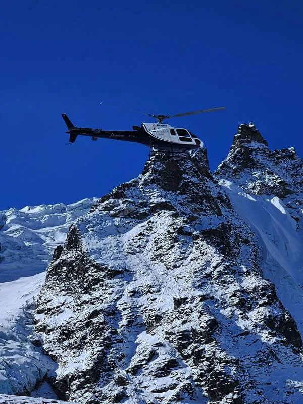 Helicopter flying over Langtang Valley