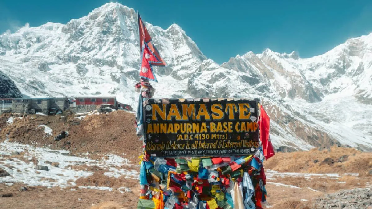 beautiful-annapurna-base-camp-with-mountains-and-welcome-board