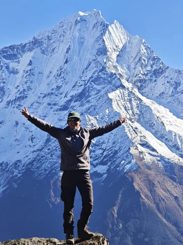 Trekker clicking picture on manaslu circuit